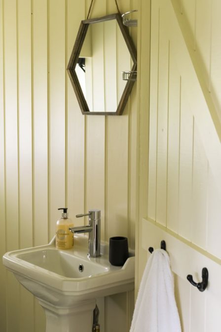 An image of the private flushing toilet and cloakroom in our luxury tents