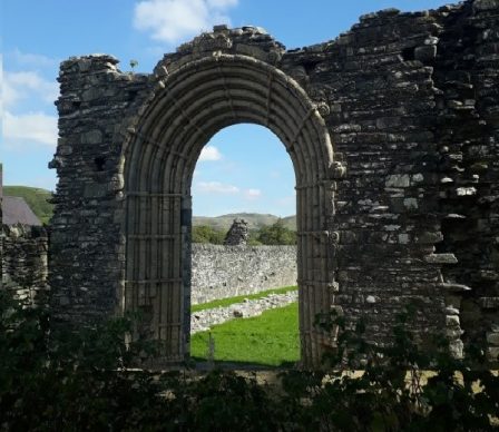 The stone arch at Strata Florida and the countryside beyon