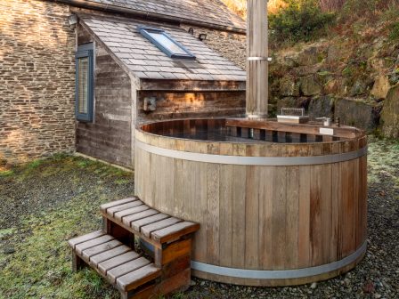 Wood fired hot tub with steps